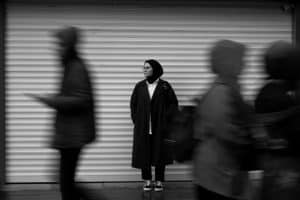 Someone having an existential crisis on a busy street - understanding the self